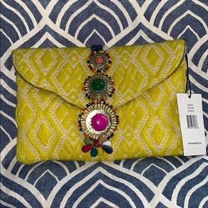Yellow Steve Madden BZADA clutch purse